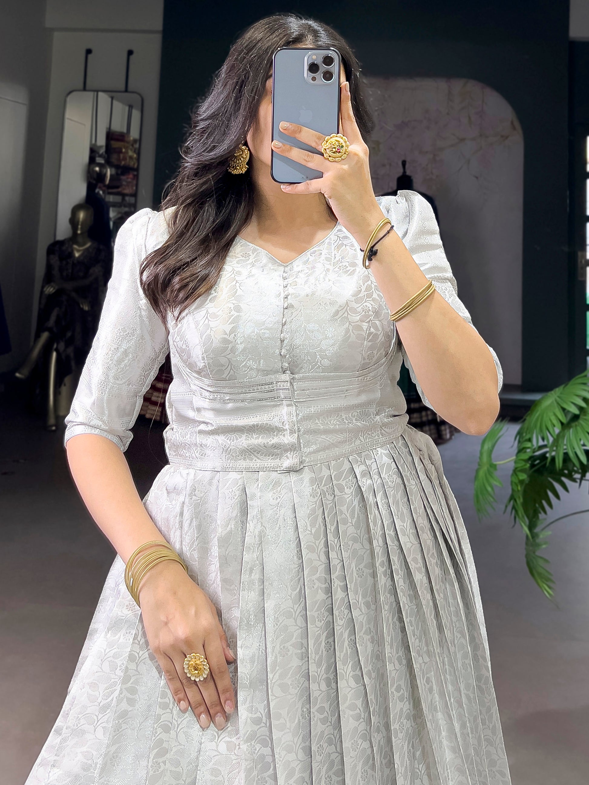 Attractive Off-White Zari Weaving Silk Event Wear Gown With Koti