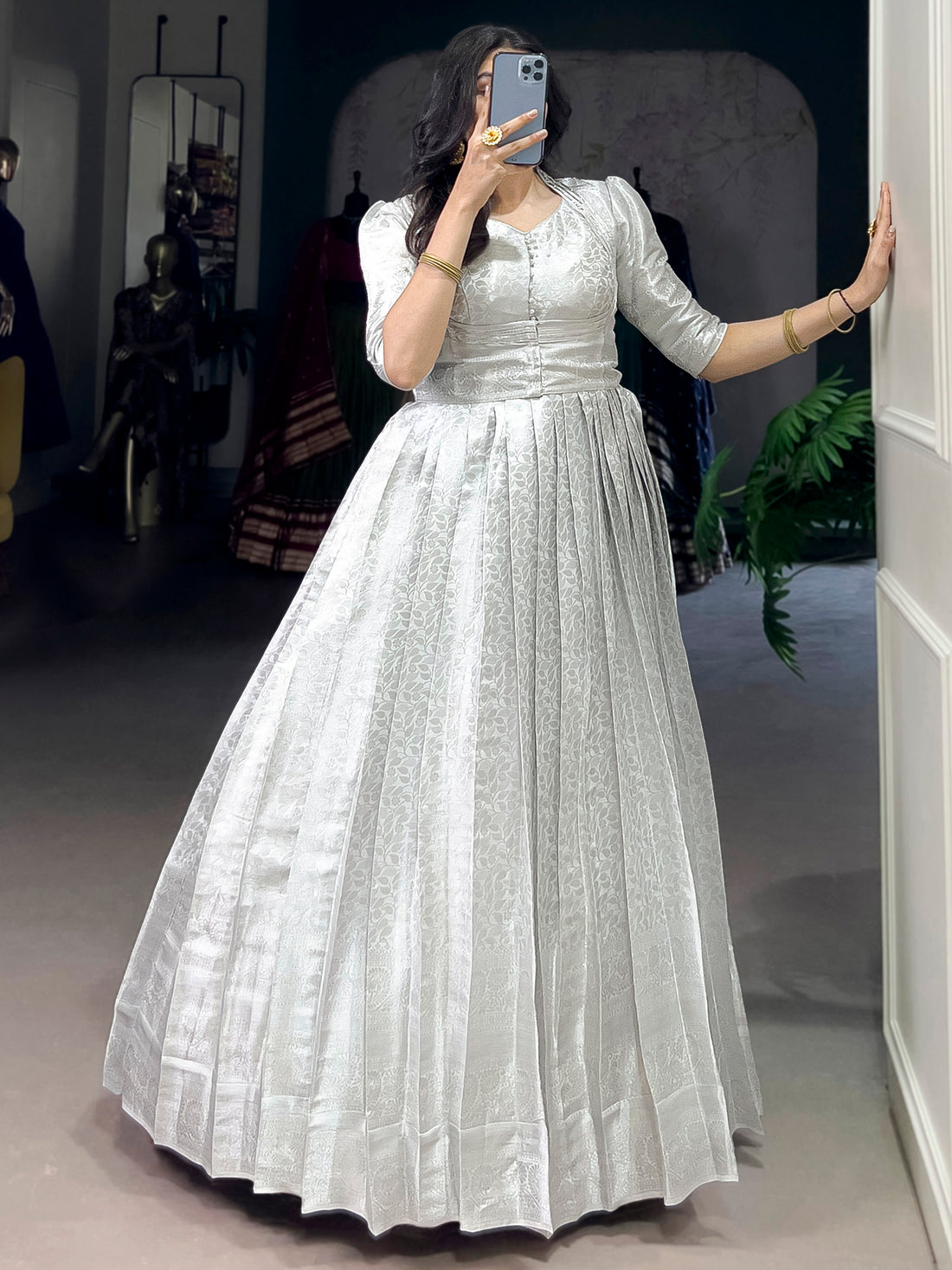 Attractive Off-White Zari Weaving Silk Event Wear Gown With Koti
