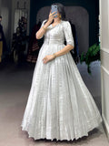 Attractive Off-White Zari Weaving Silk Event Wear Gown With Koti