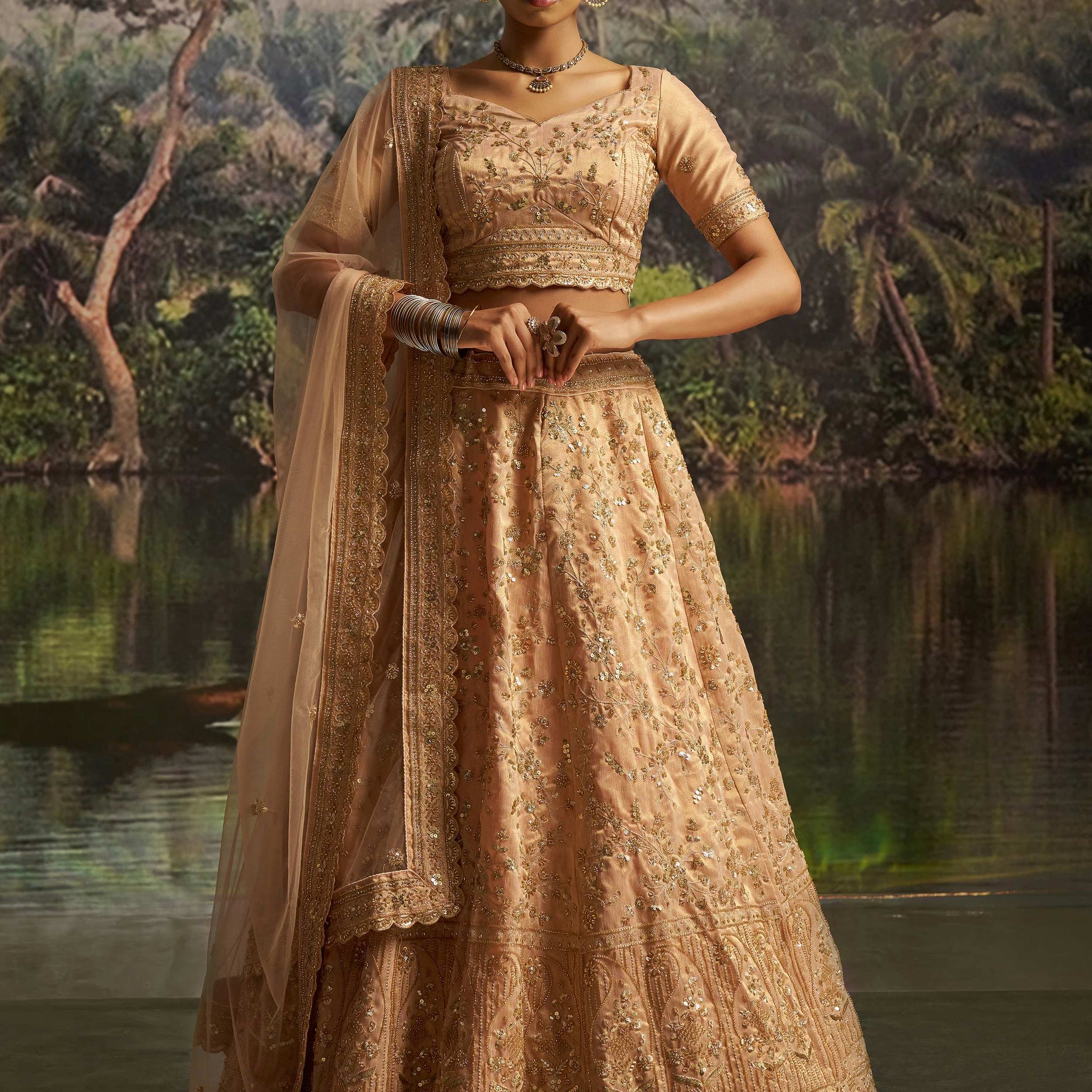 Rich Peach Dori Embroidery Net Sangeet Wear Lehenga Choli With Dupatta