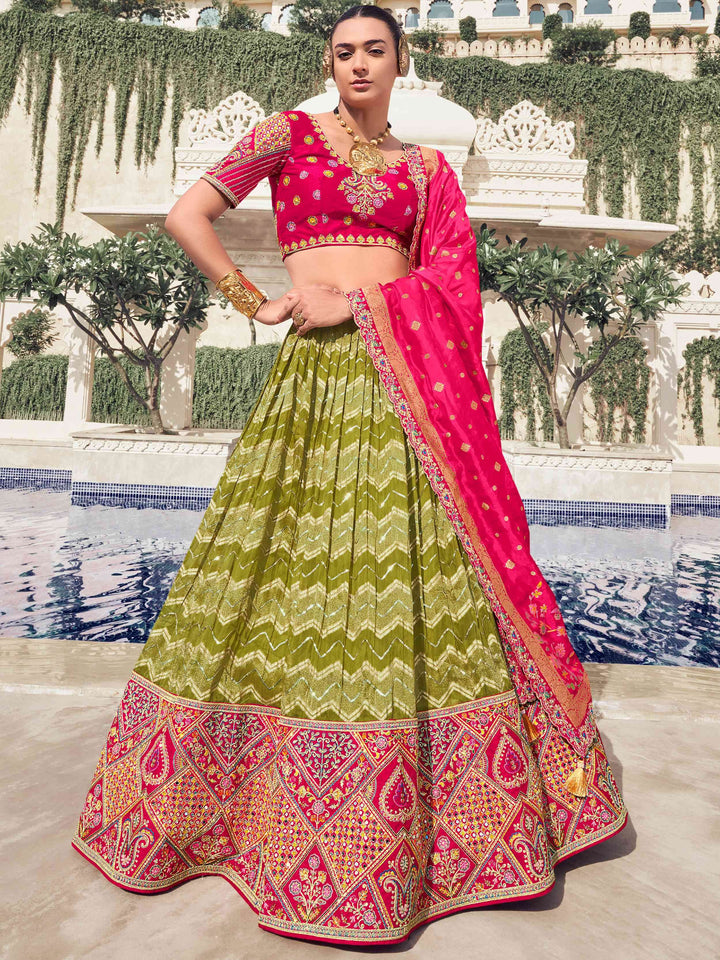 Grand Olive Green Embroidered Organza Function Wear Lehenga With Blouse