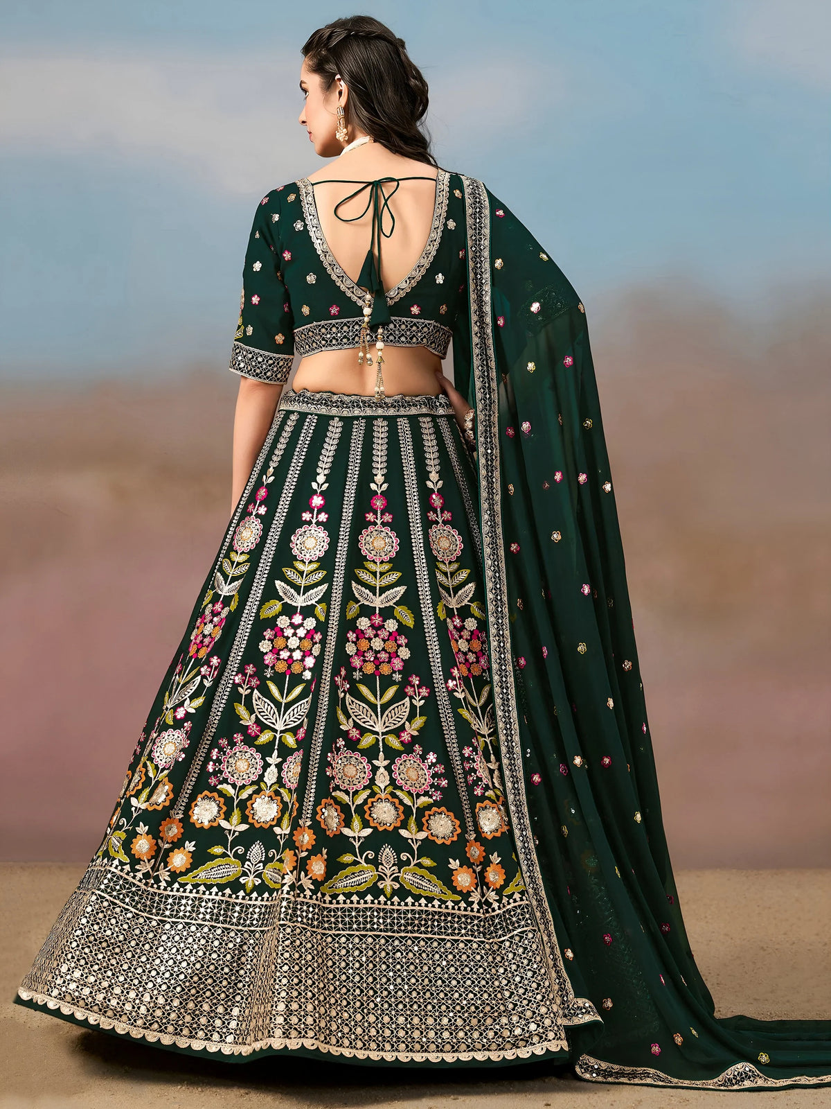 Fascinating Green Sequins Georgette Mehendi Wear Lehenga Choli