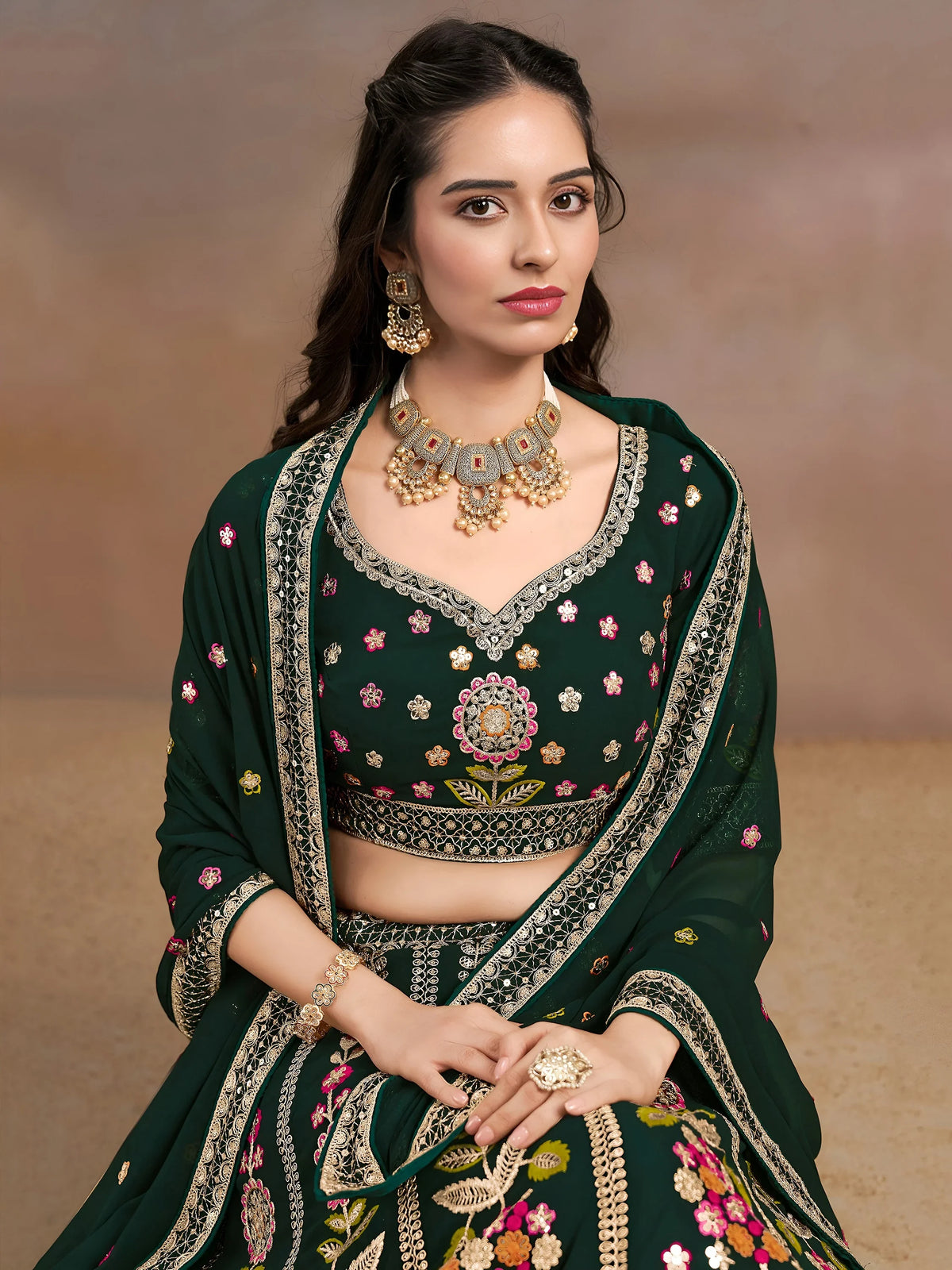 Fascinating Green Sequins Georgette Mehendi Wear Lehenga Choli