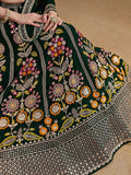 Fascinating Green Sequins Georgette Mehendi Wear Lehenga Choli