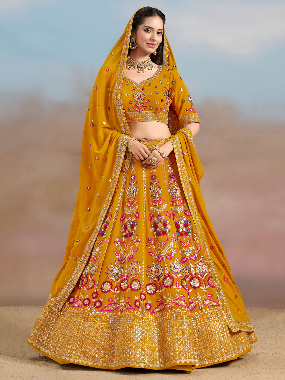 Pretty Yellow Thread Embroidered Georgette Haldi Wear Lehenga Choli