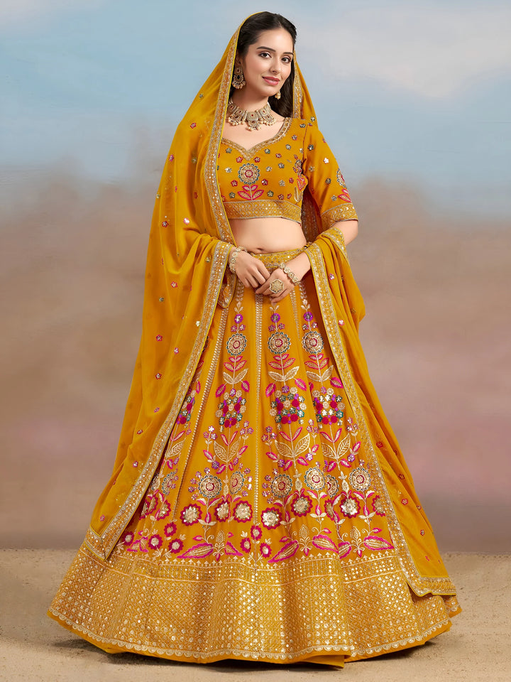 Pretty Yellow Thread Embroidered Georgette Haldi Wear Lehenga Choli