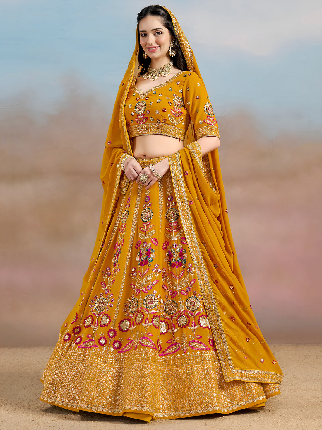 Pretty Yellow Thread Embroidered Georgette Haldi Wear Lehenga Choli