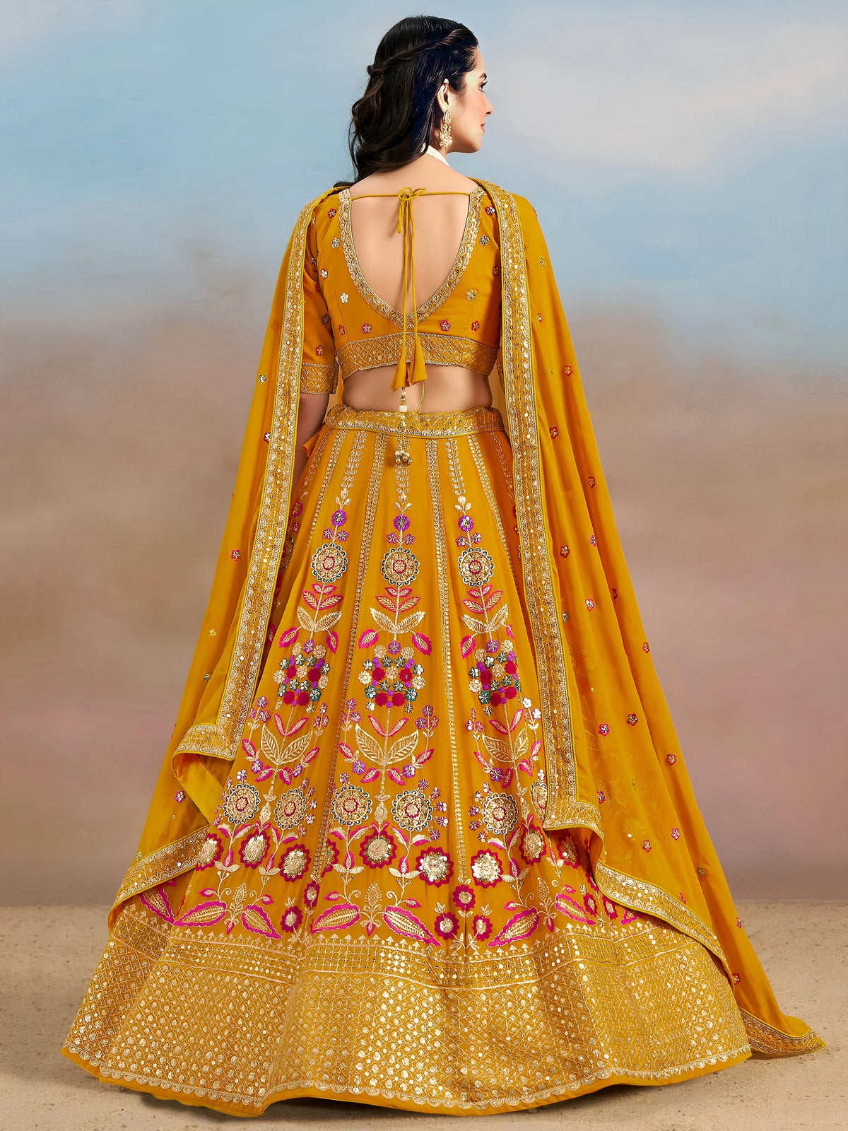 Pretty Yellow Thread Embroidered Georgette Haldi Wear Lehenga Choli