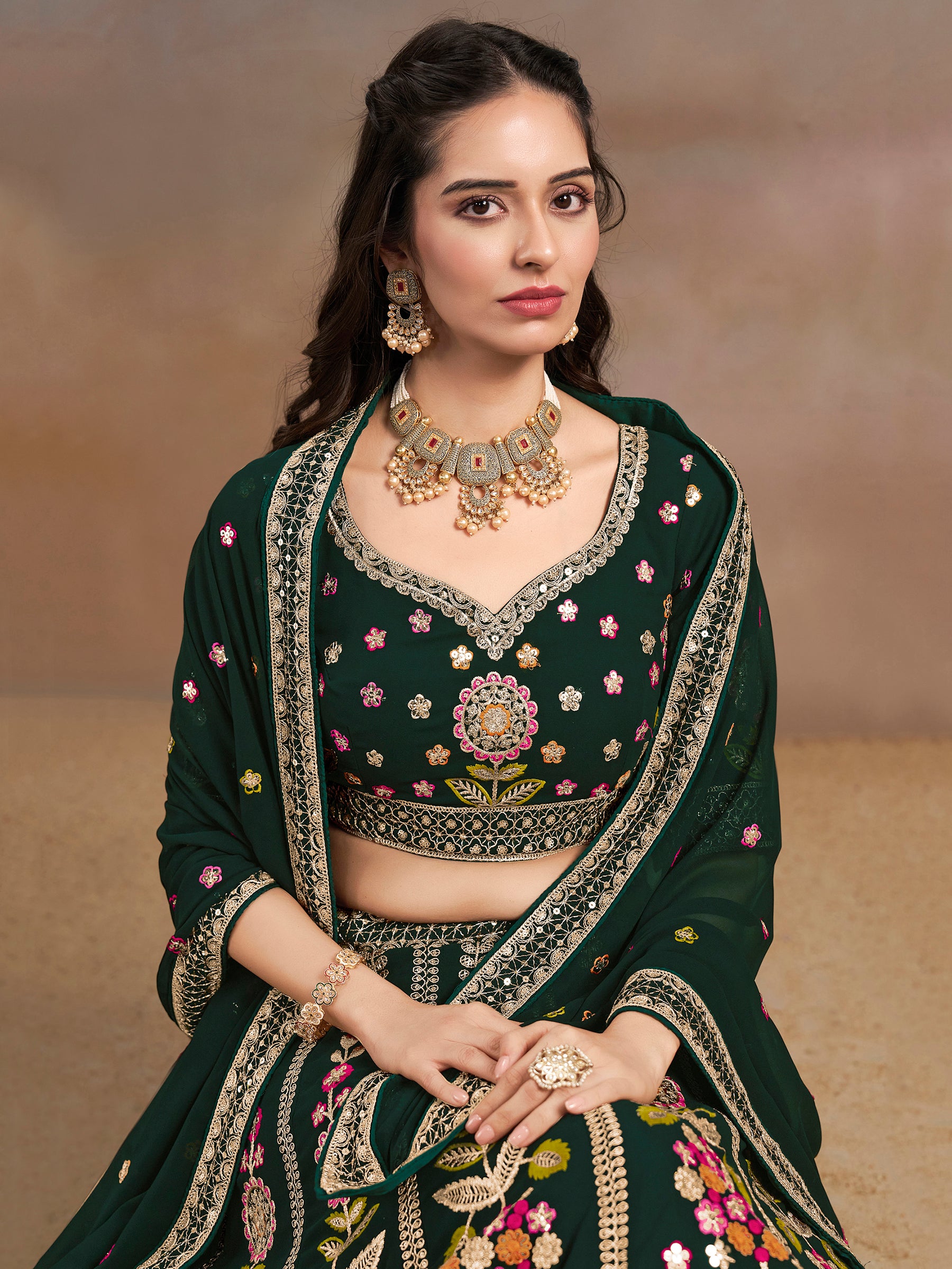 Fascinating Green Sequins Georgette Mehendi Wear Lehenga Choli