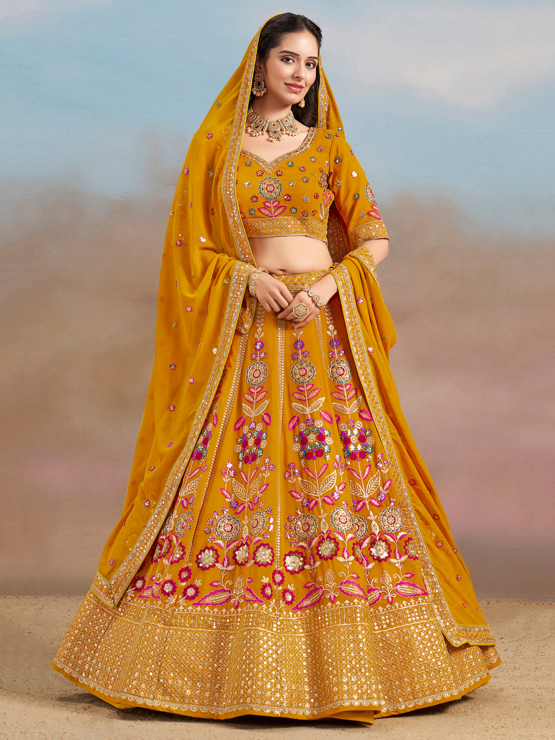 Pretty Yellow Thread Embroidered Georgette Haldi Wear Lehenga Choli