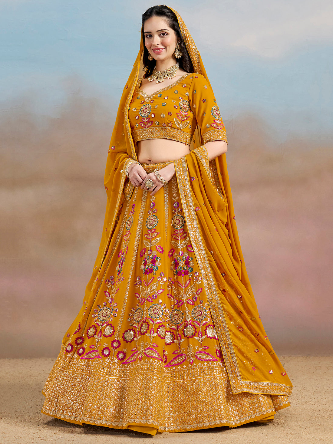 Pretty Yellow Thread Embroidered Georgette Haldi Wear Lehenga Choli