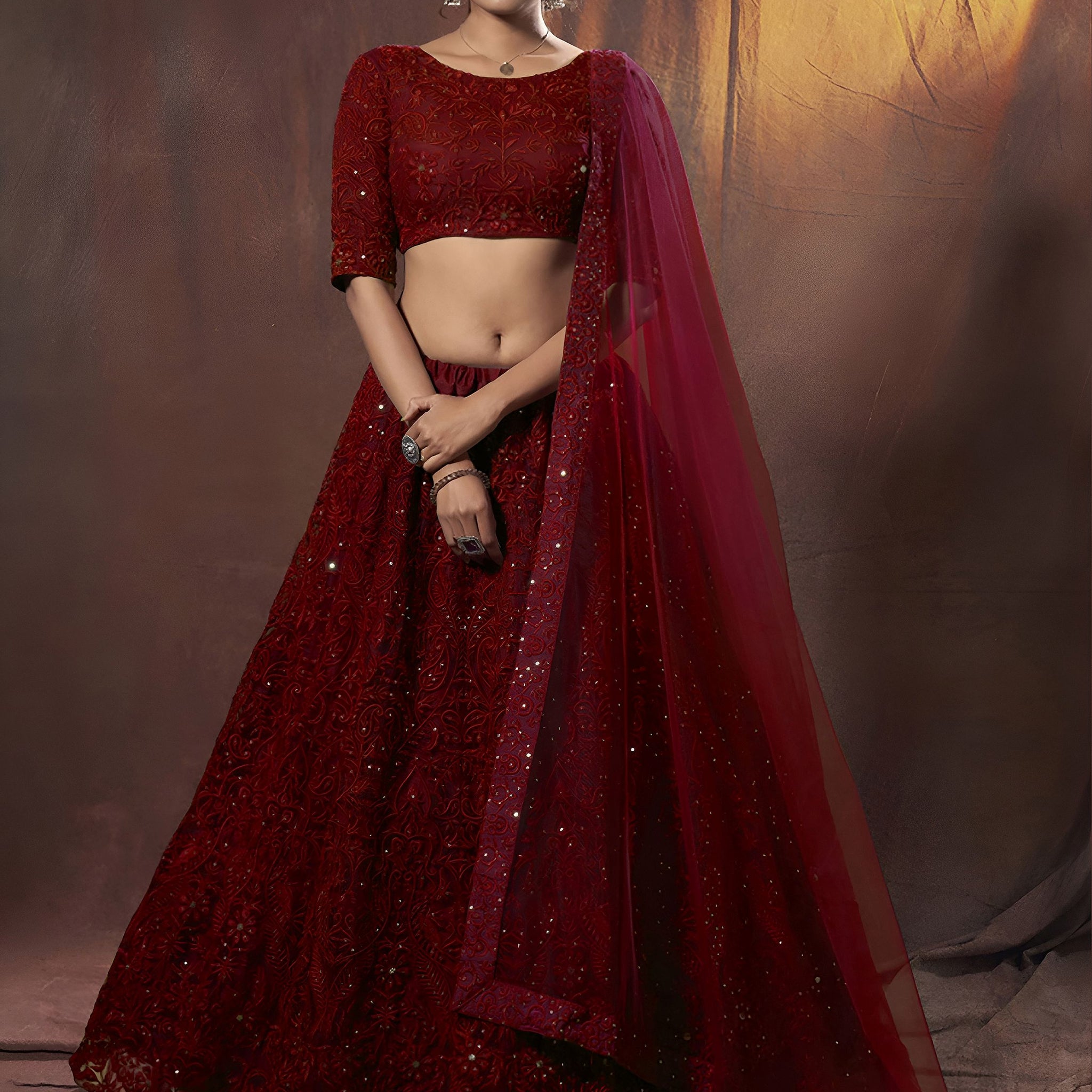 Magnetic Maroon Thread Work Net Wedding Wear Lehenga With Blouse