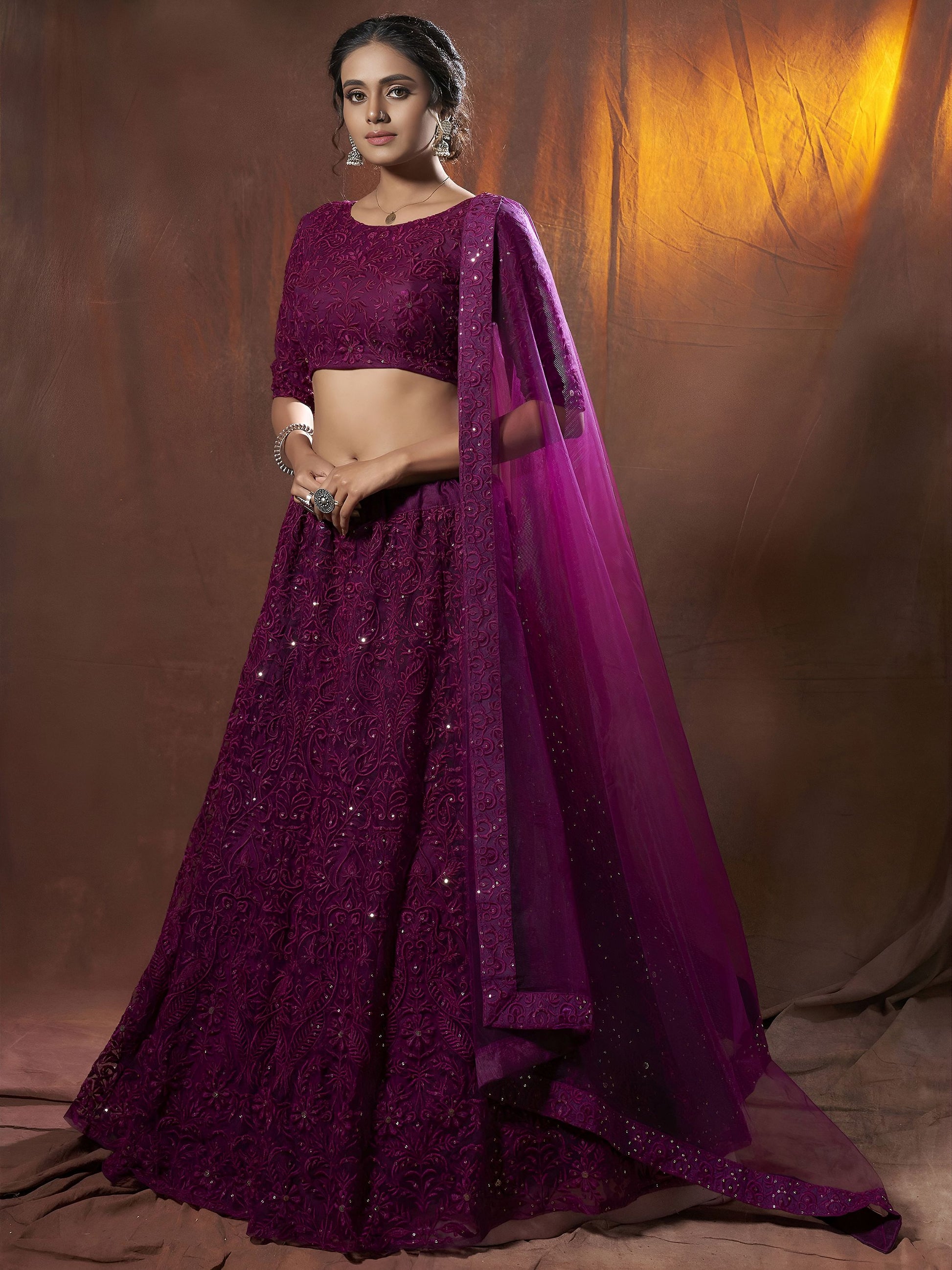 Alluring Purple Embroidered Net Reception Wear Lehenga Choli With Dupatta