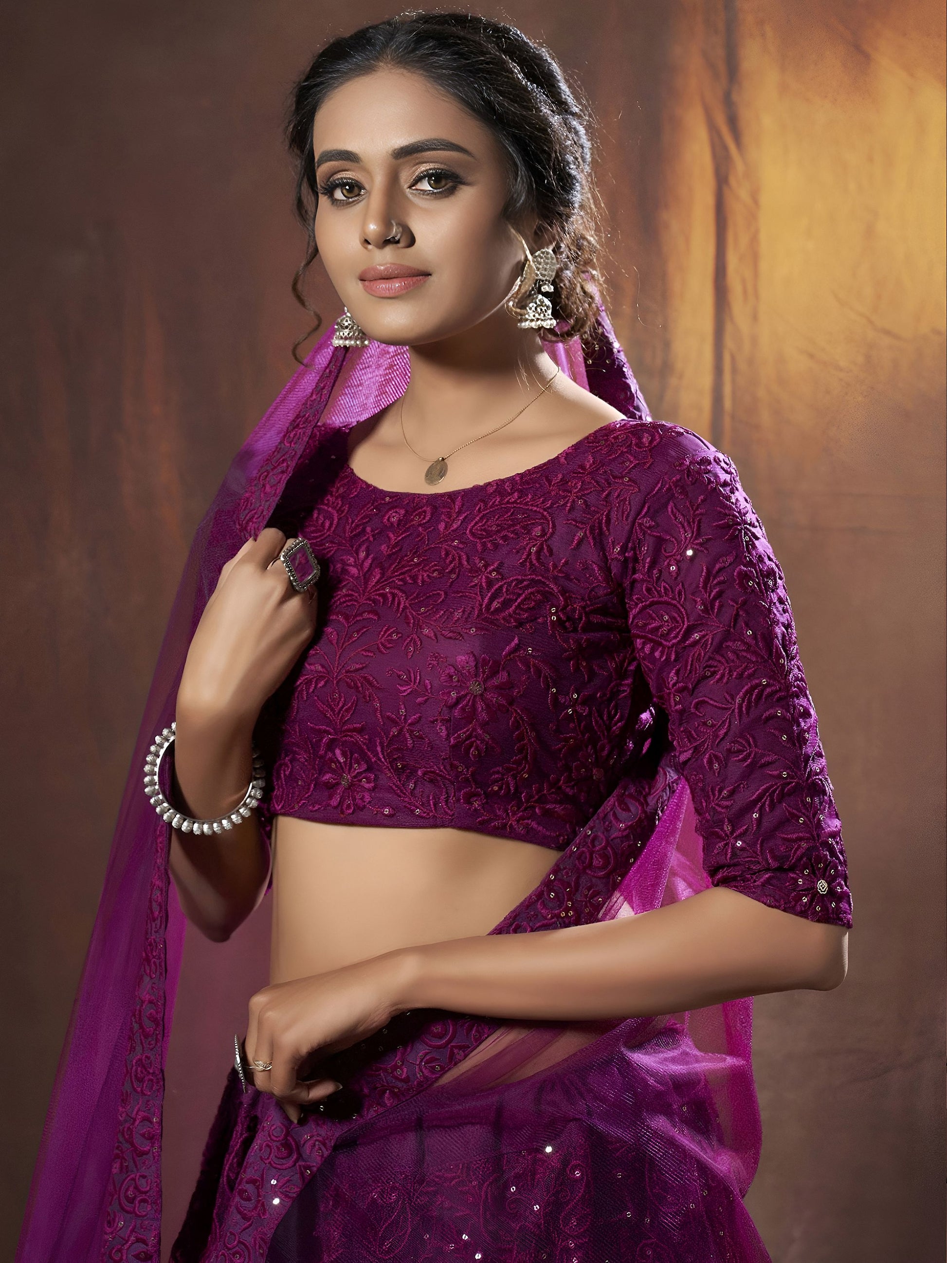 Alluring Purple Embroidered Net Reception Wear Lehenga Choli With Dupatta