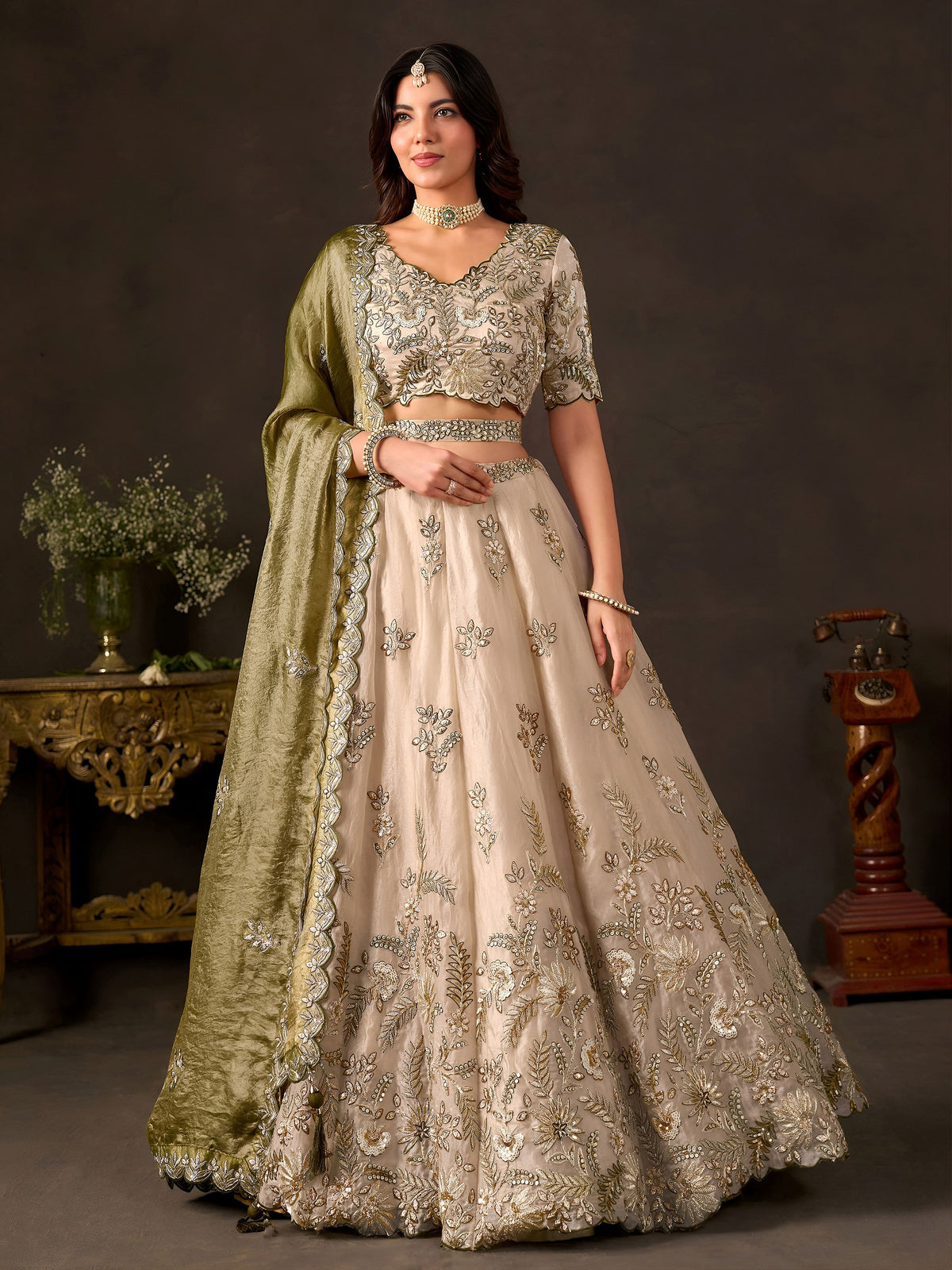 Graceful Cream Embroidered Silk Reception Wear Lehenga Choli