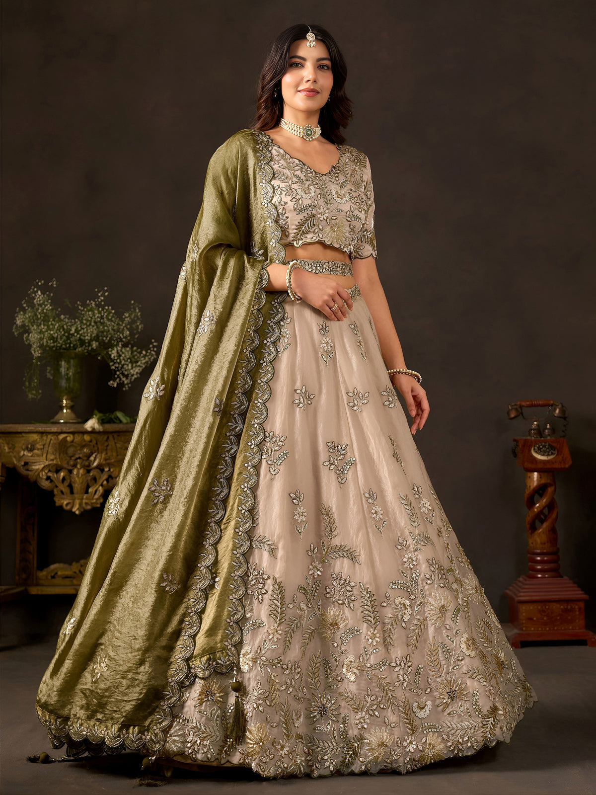 Graceful Cream Embroidered Silk Reception Wear Lehenga Choli