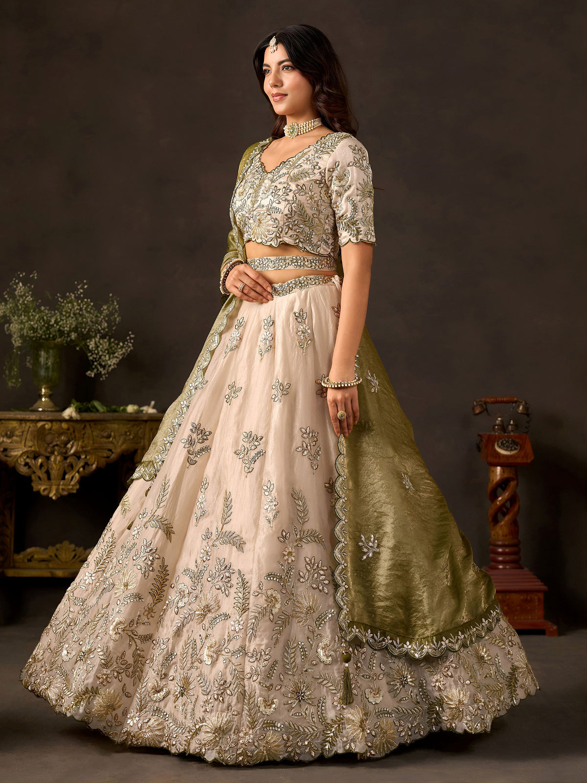 Graceful Cream Embroidered Silk Reception Wear Lehenga Choli