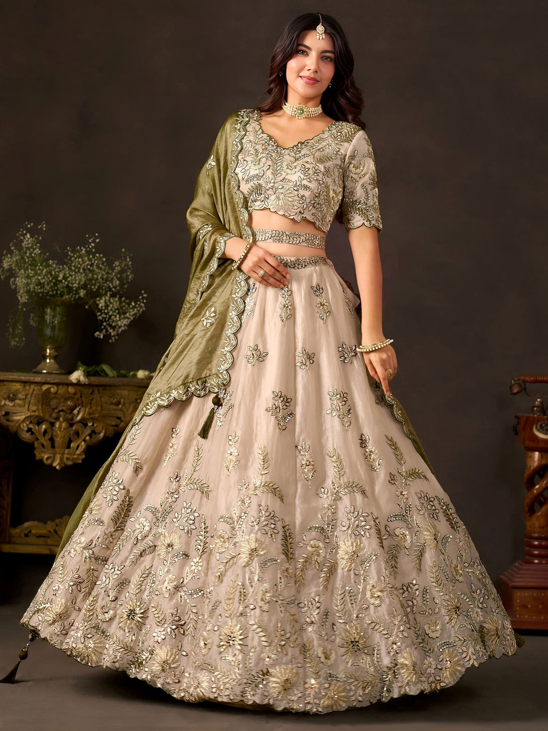 Graceful Cream Embroidered Silk Reception Wear Lehenga Choli