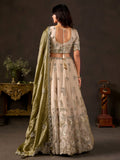 Graceful Cream Embroidered Silk Reception Wear Lehenga Choli