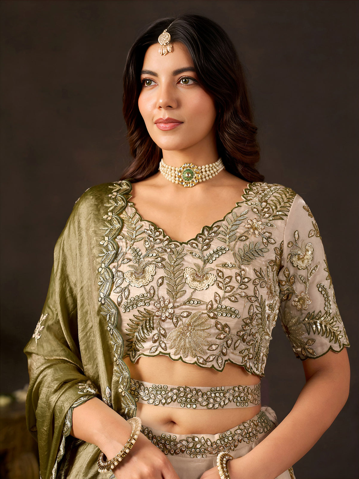 Graceful Cream Embroidered Silk Reception Wear Lehenga Choli