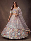 Lovely Lavender Embroidered Net Wedding Wear Lehenga Choli With Dupatta