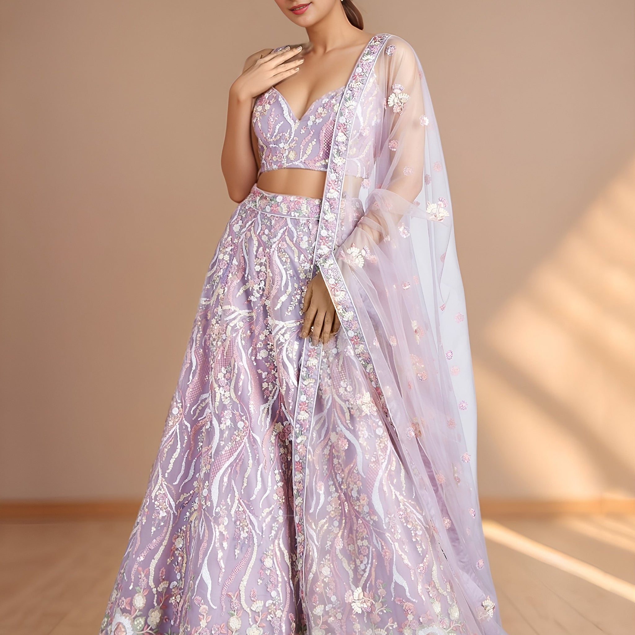 Exclusive Lavender Thread Embroidery Net Reception Wear Lehenga Choli