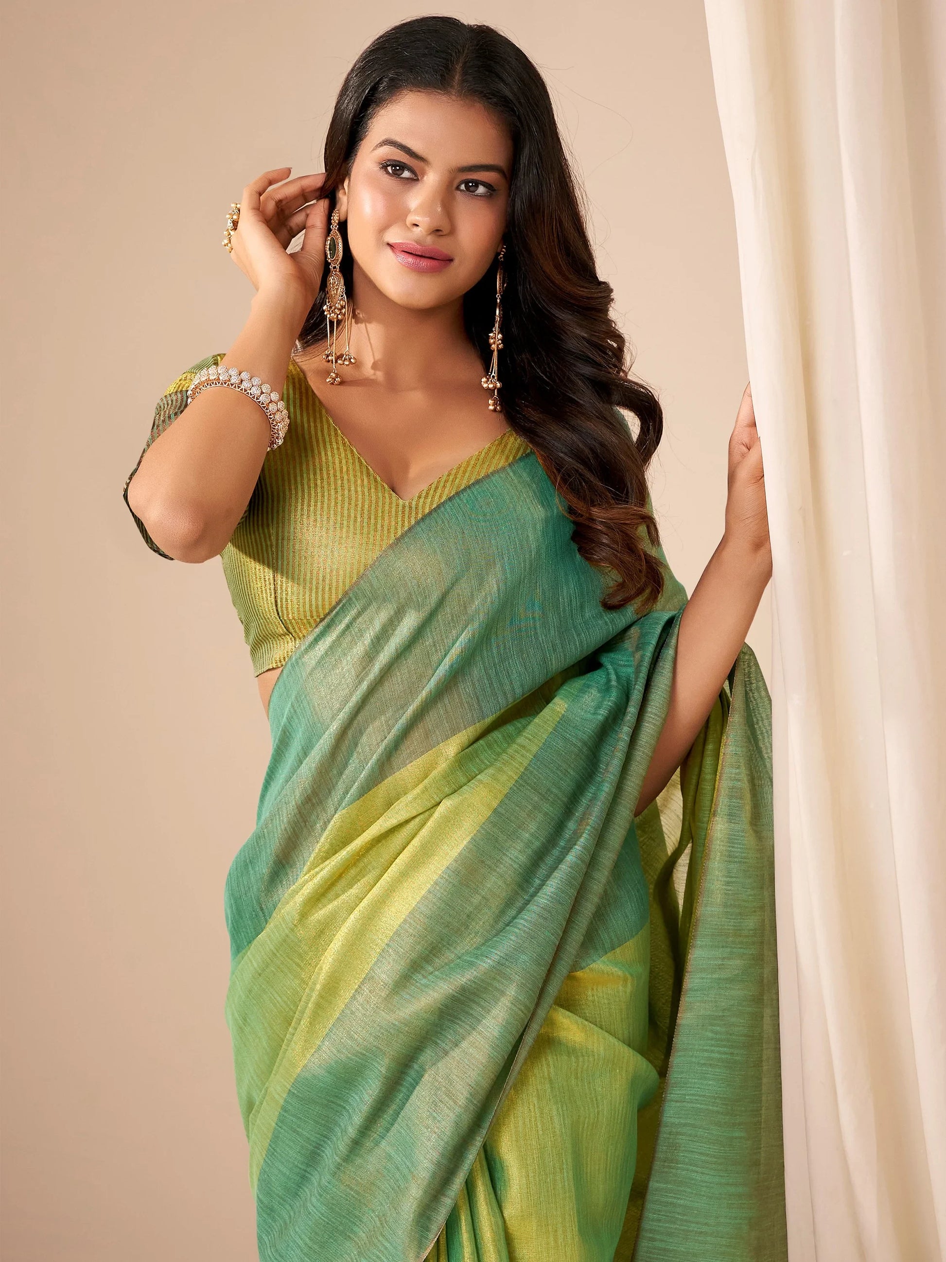 Sophisticated Green Zari Weaving Tissue Evening Wear Saree With Blouse