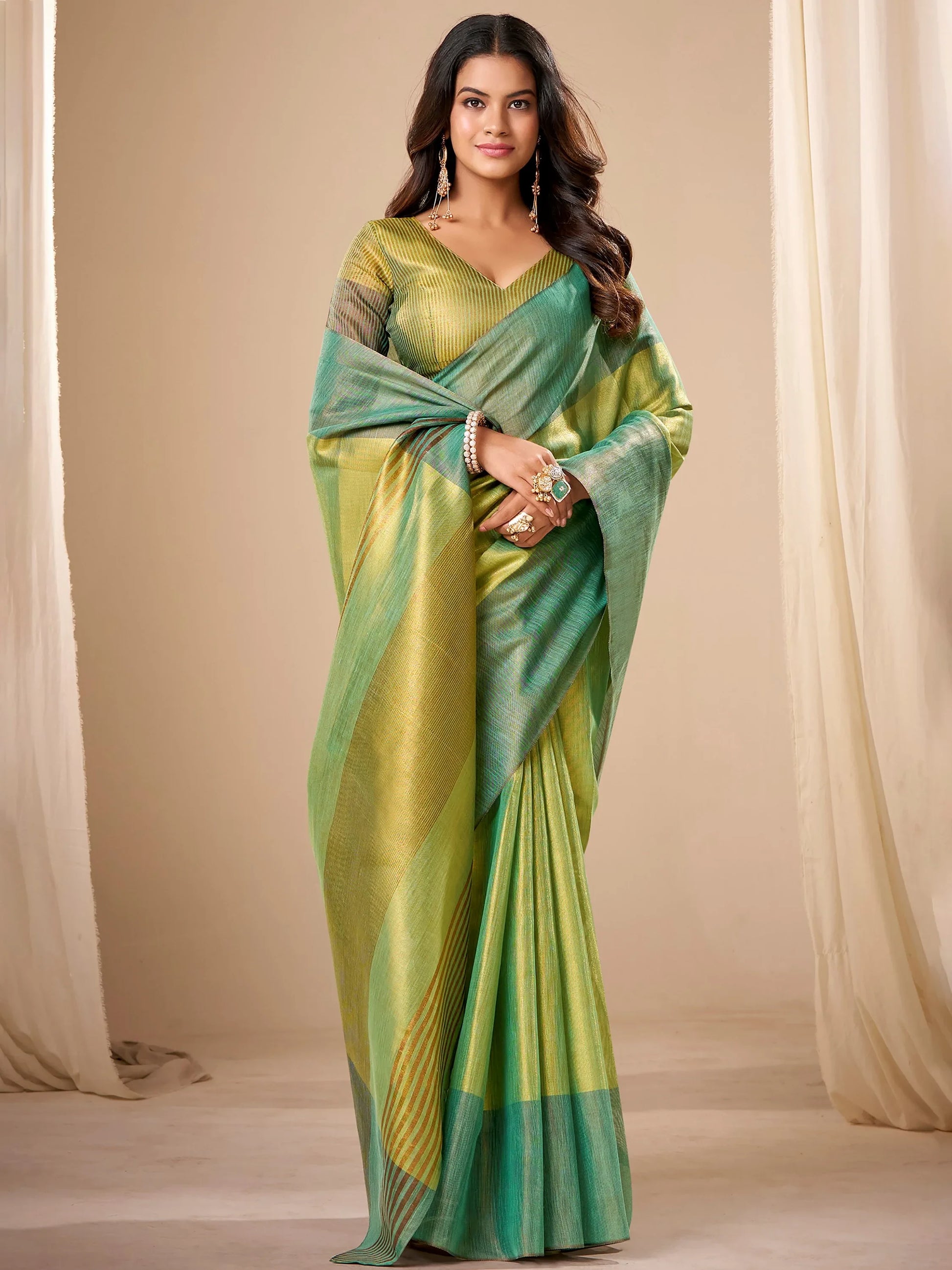 Sophisticated Green Zari Weaving Tissue Evening Wear Saree With Blouse