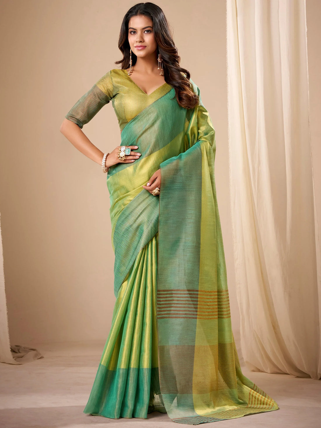 Sophisticated Green Zari Weaving Tissue Evening Wear Saree With Blouse