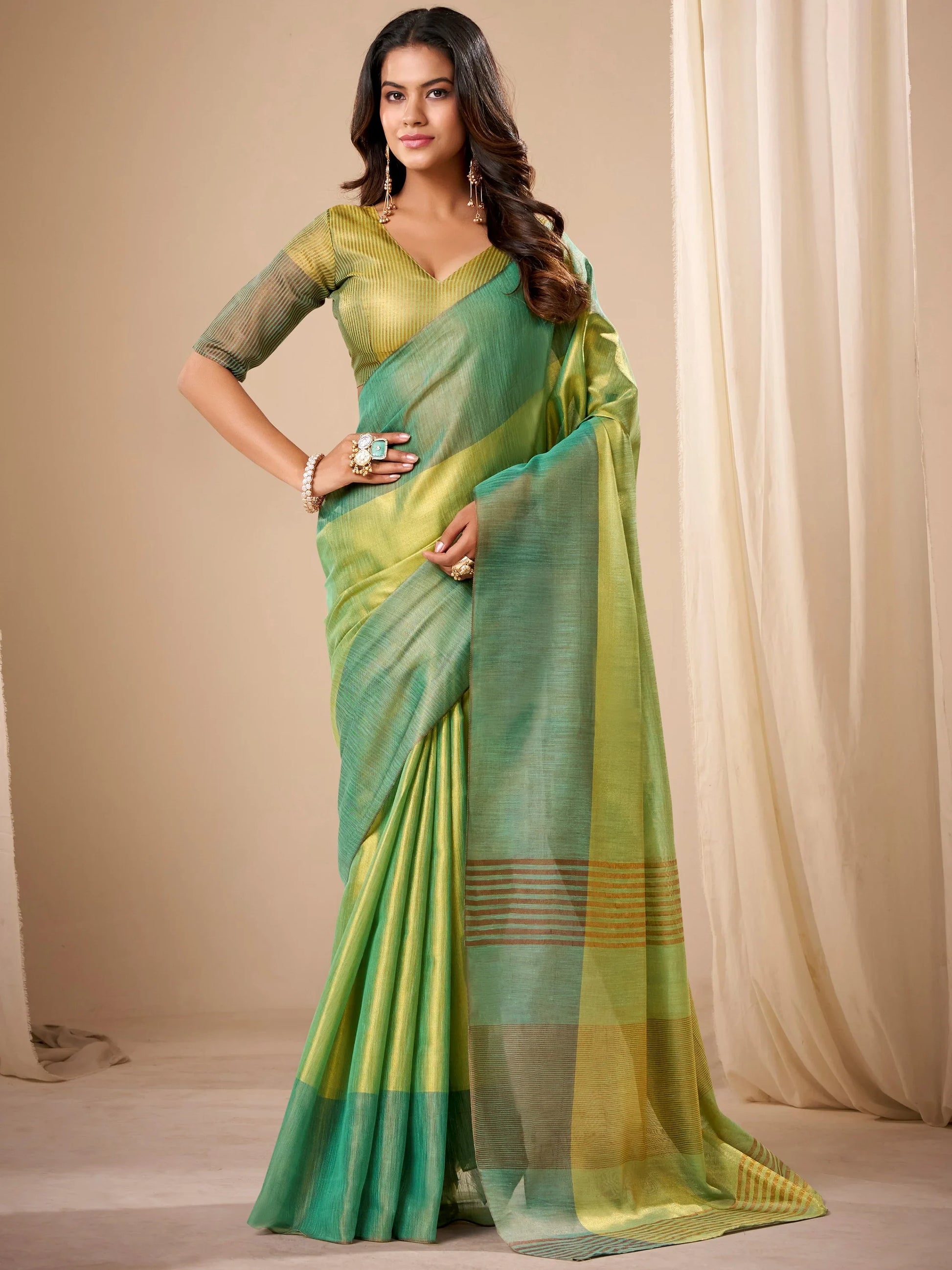 Sophisticated Green Zari Weaving Tissue Evening Wear Saree With Blouse