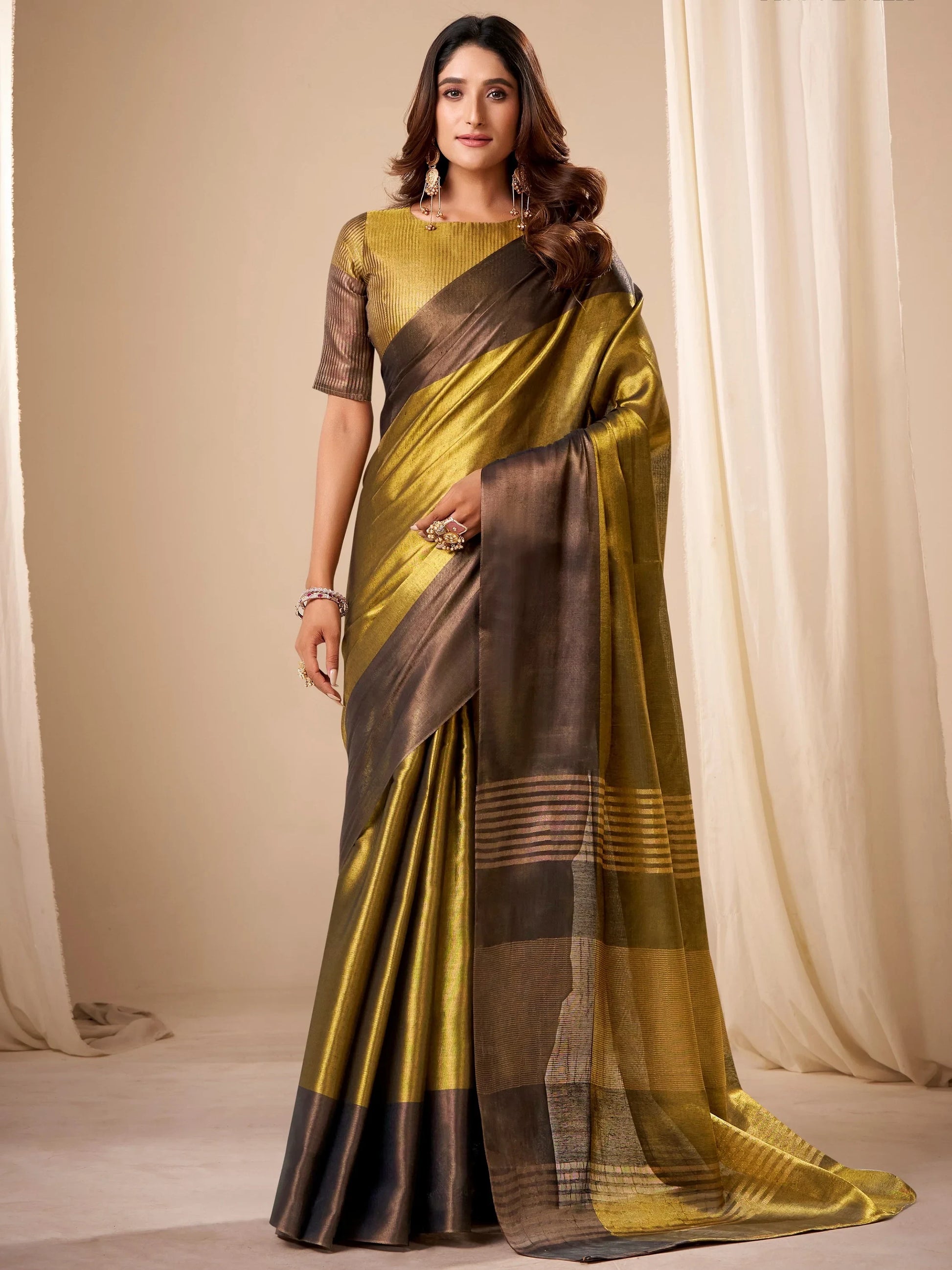 Mesmerizing Green Zari Weaving Tissue Traditional Saree With Blouse