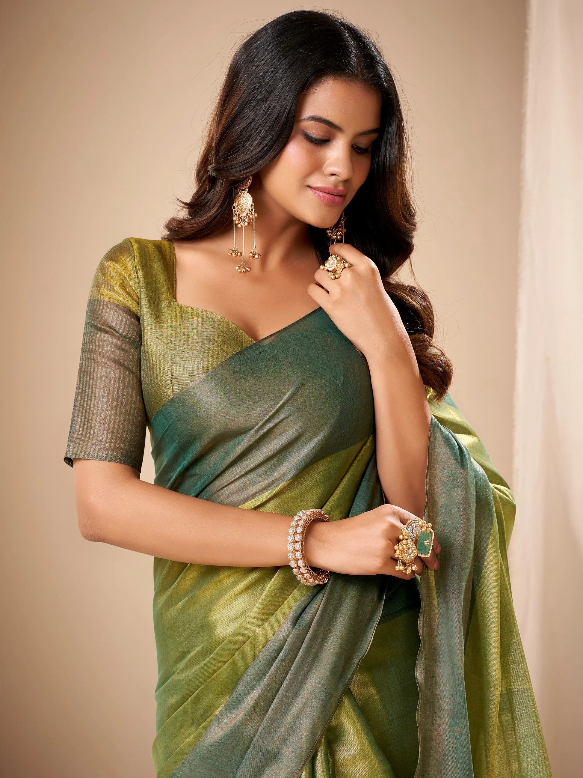 Awesome Olive Green Zari Weaving Tissue Mehendi Wear Saree With Blouse