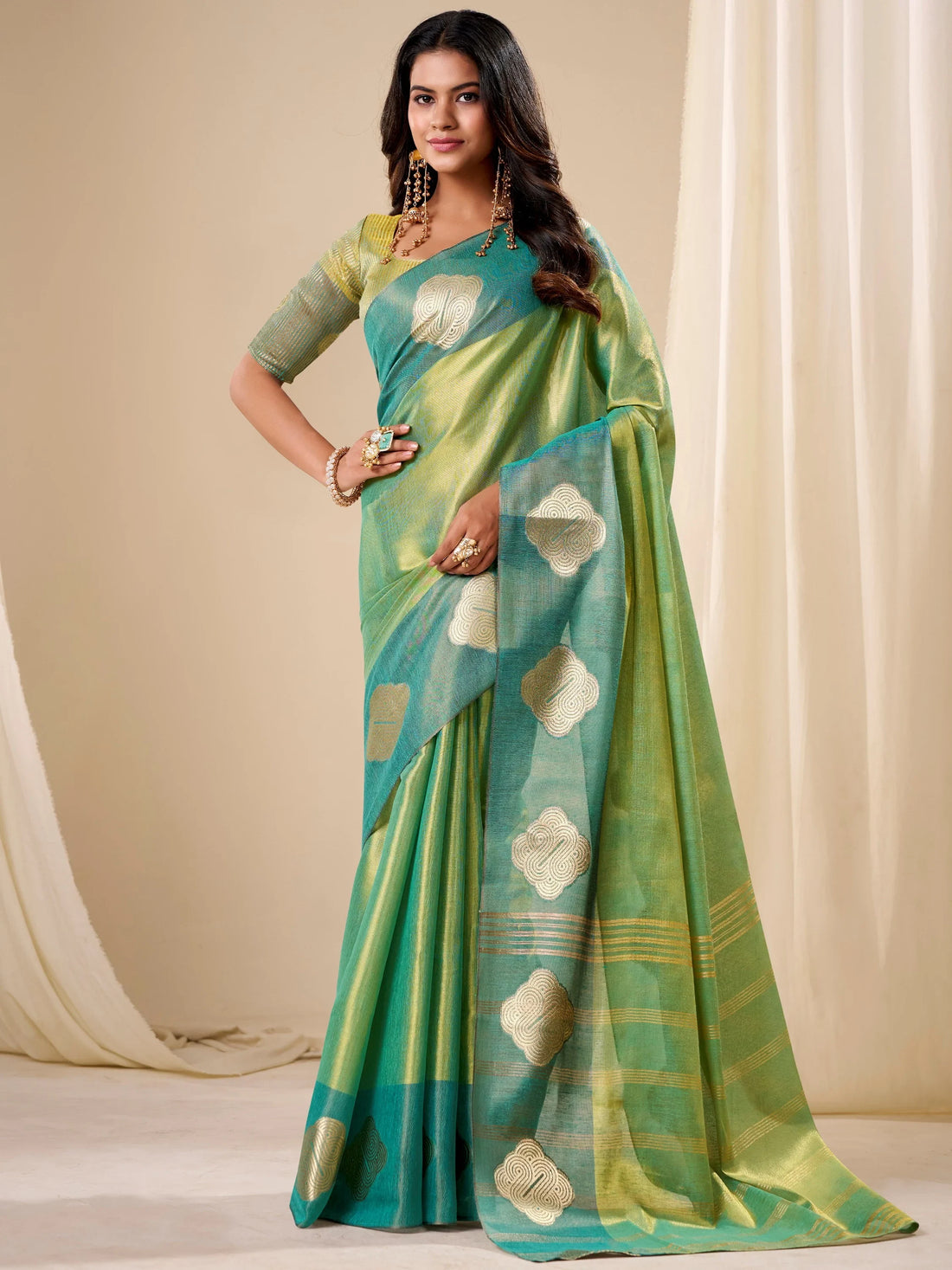 Striking Green Zari Weaving Tissue Festive Wear Saree With Blouse