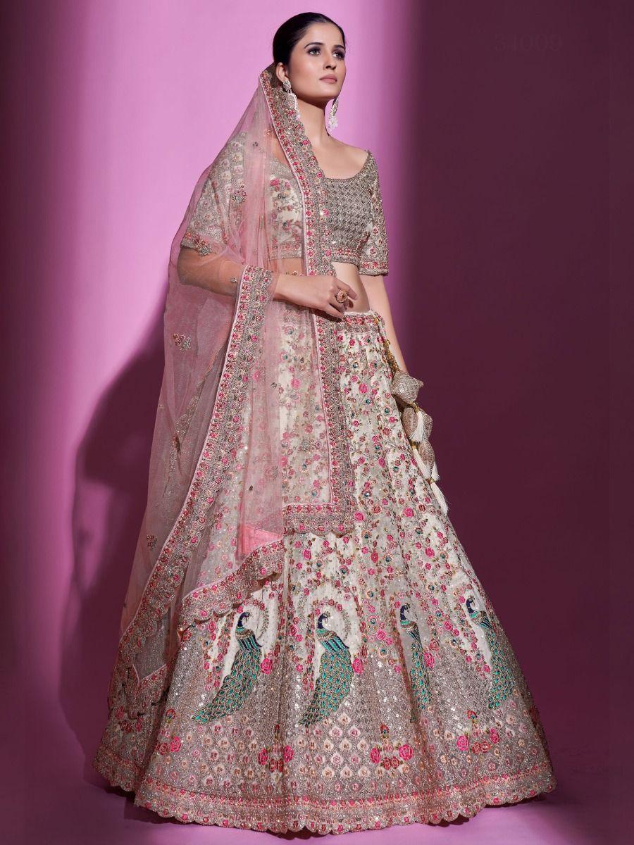 Magnificent Cream Sequins Soft Net Wedding Wear Lehenga Choli