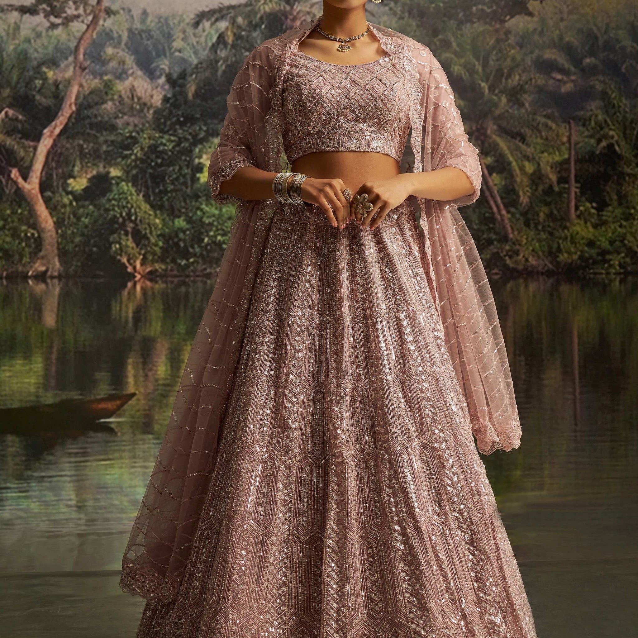 Dazzling Mauve Heavy Embroidered Net Event Wear Lehenga With Blouse