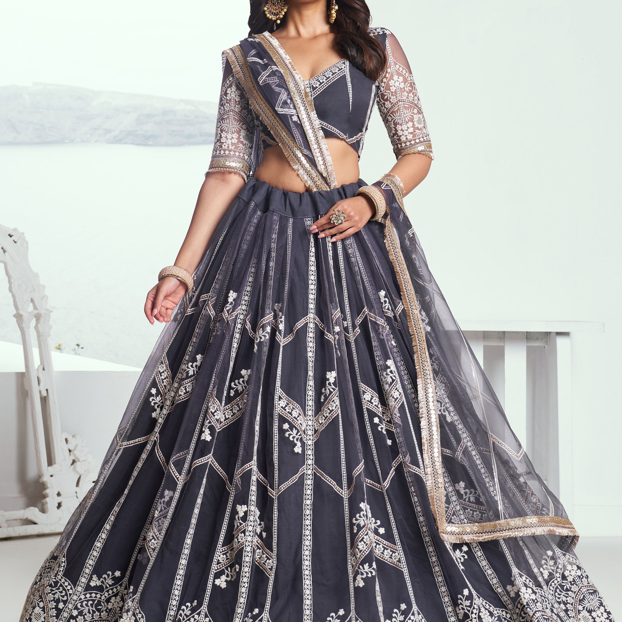 Charming Dark Grey Embroidered Net Reception Wear Lehenga Choli
