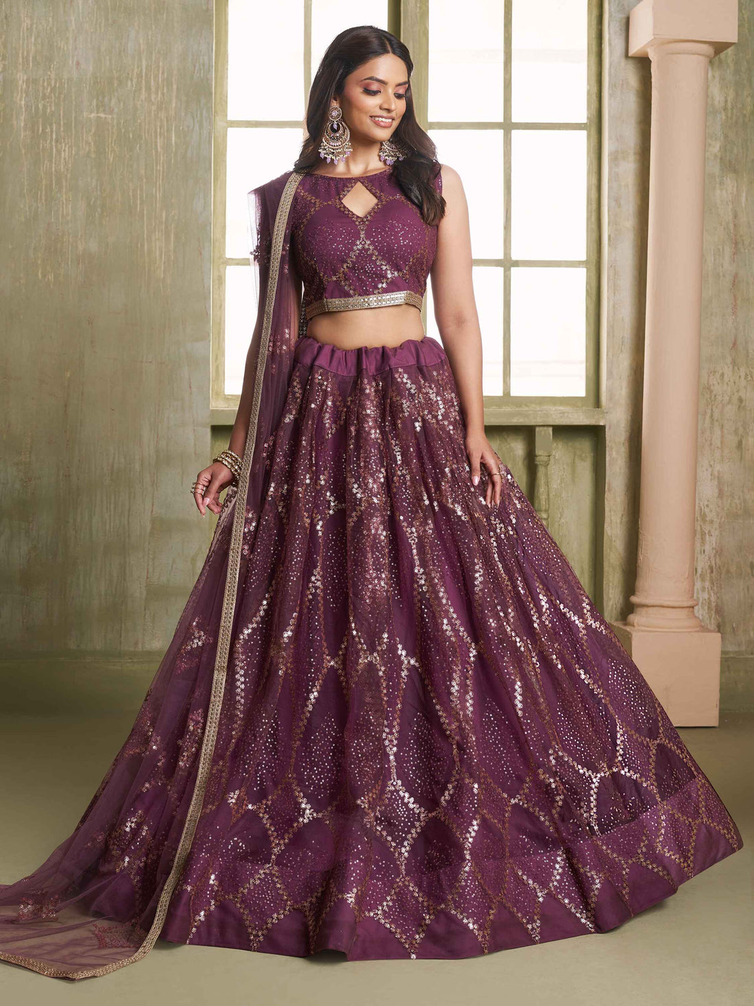 Attractive Wine Sequins Net Party Wear Lehenga Choli With Dupatta