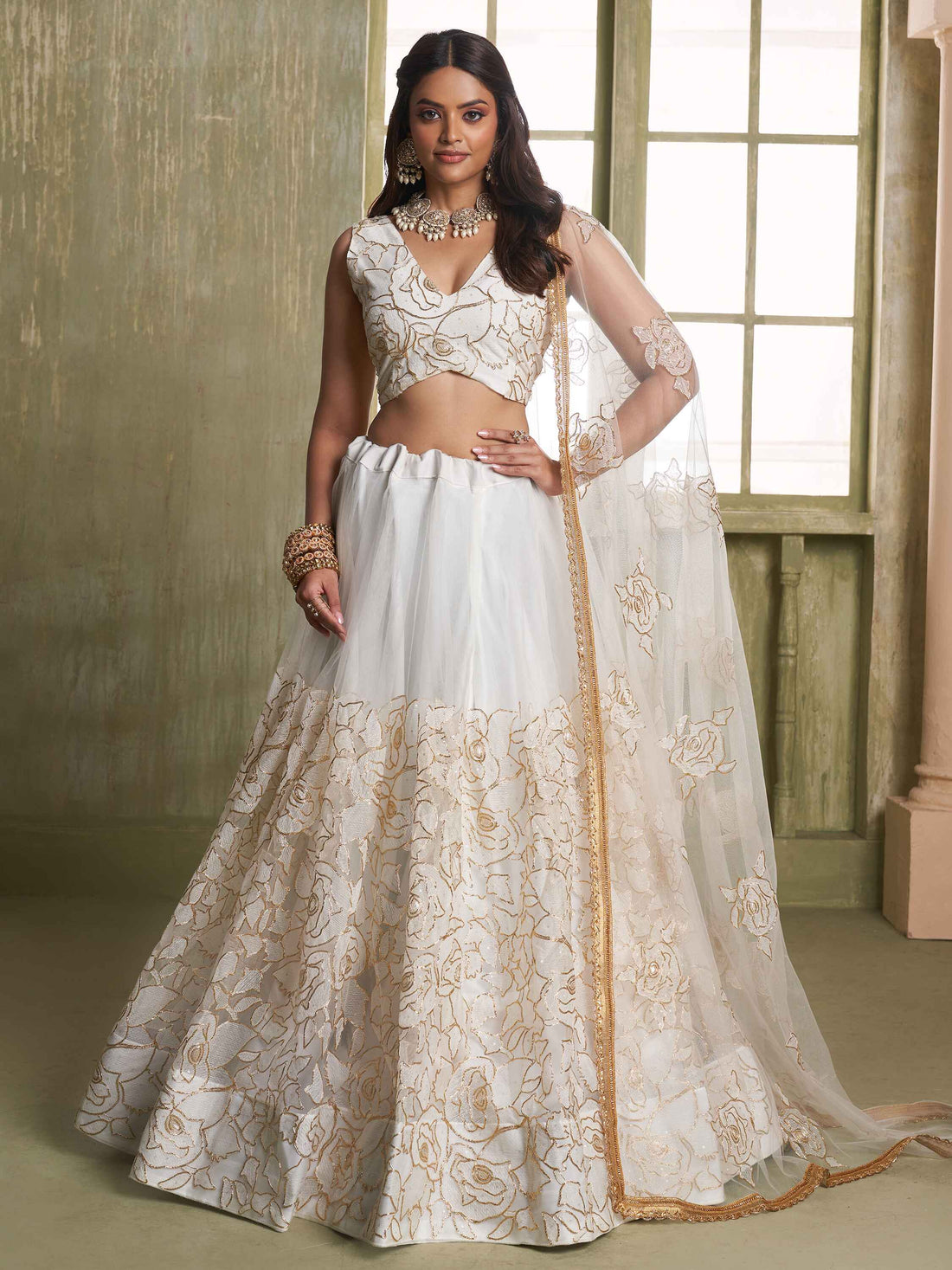 Amazing Off-White Embroidered Net Wedding Wear Lehenga Choli