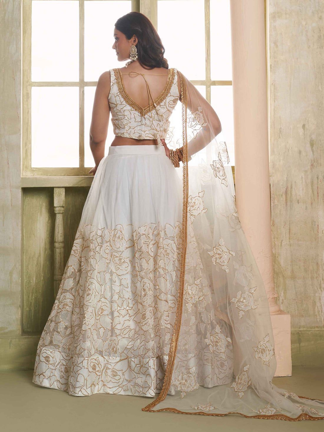 Amazing Off-White Embroidered Net Wedding Wear Lehenga Choli