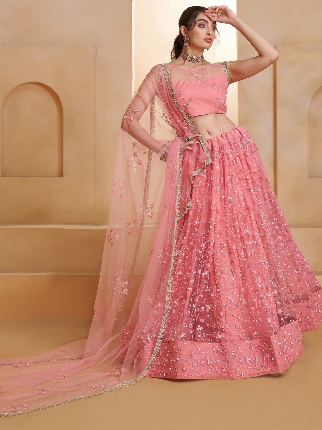 Lavish Pink Thread Work Net Reception Wear Lehenga Choli