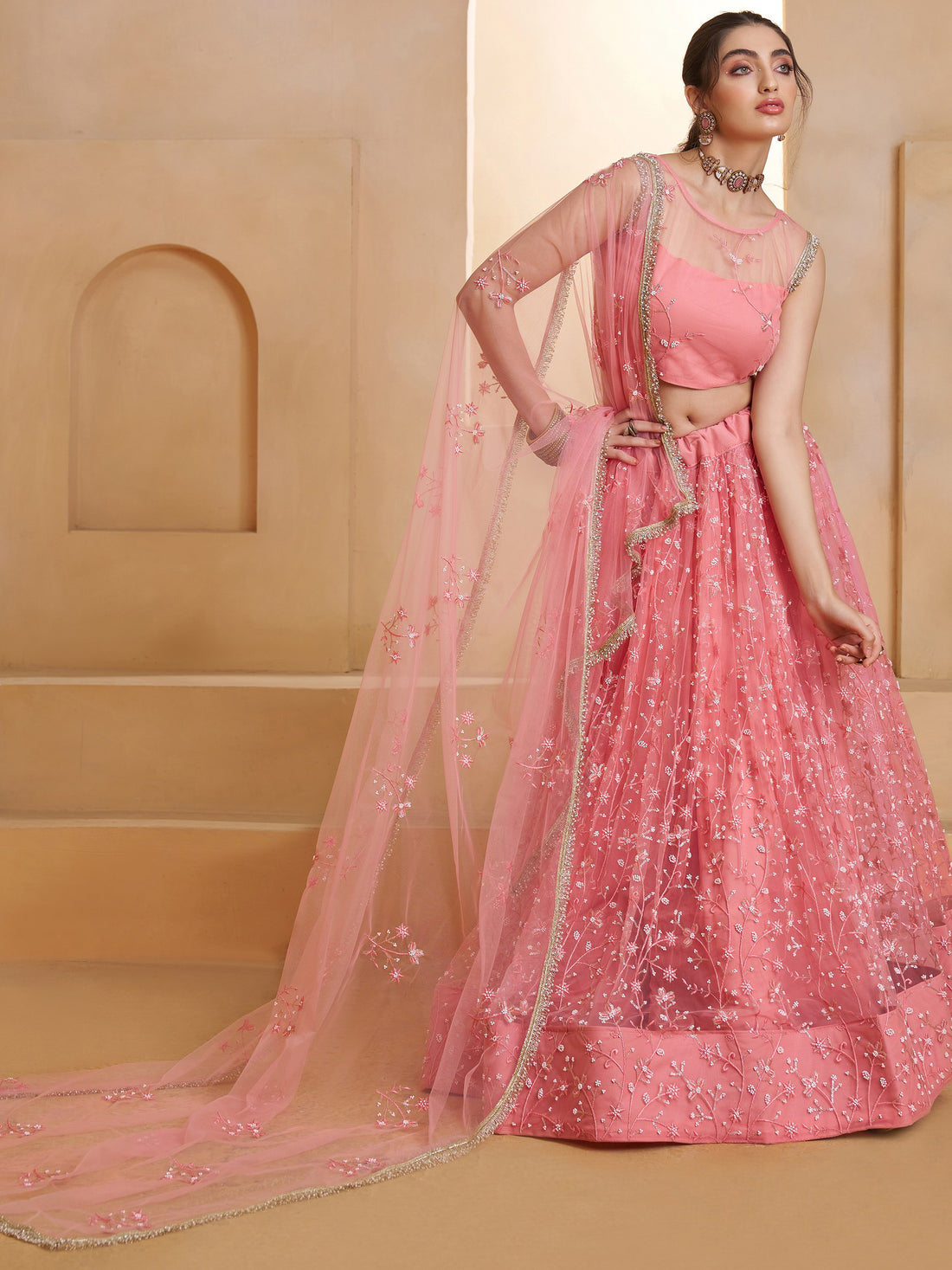 Lavish Pink Thread Work Net Reception Wear Lehenga Choli
