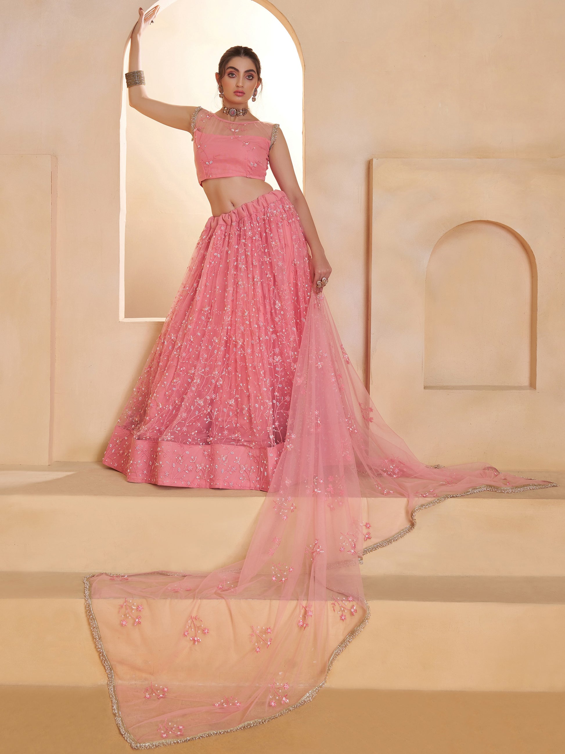 Lavish Pink Thread Work Net Reception Wear Lehenga Choli