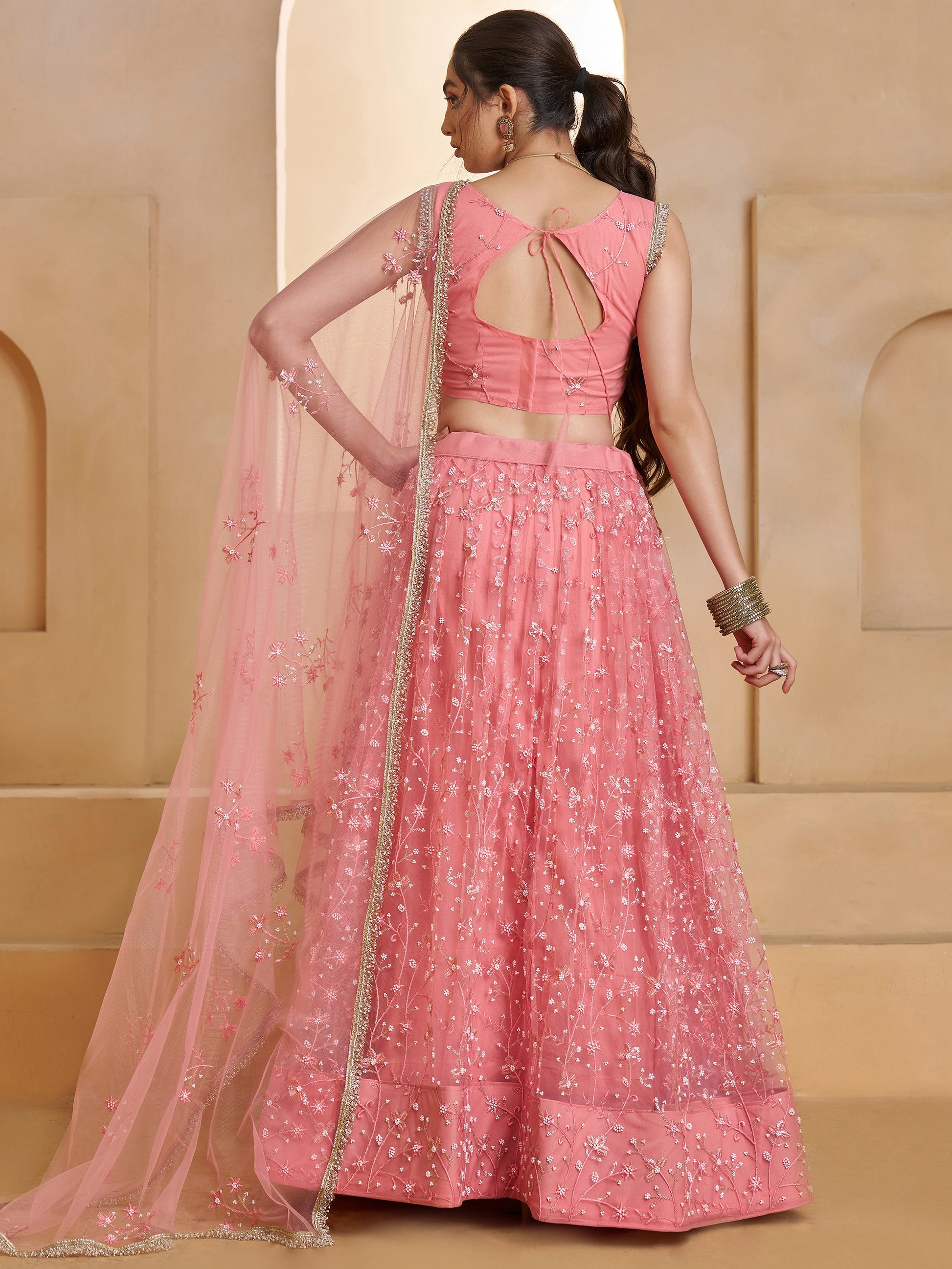 Lavish Pink Thread Work Net Reception Wear Lehenga Choli