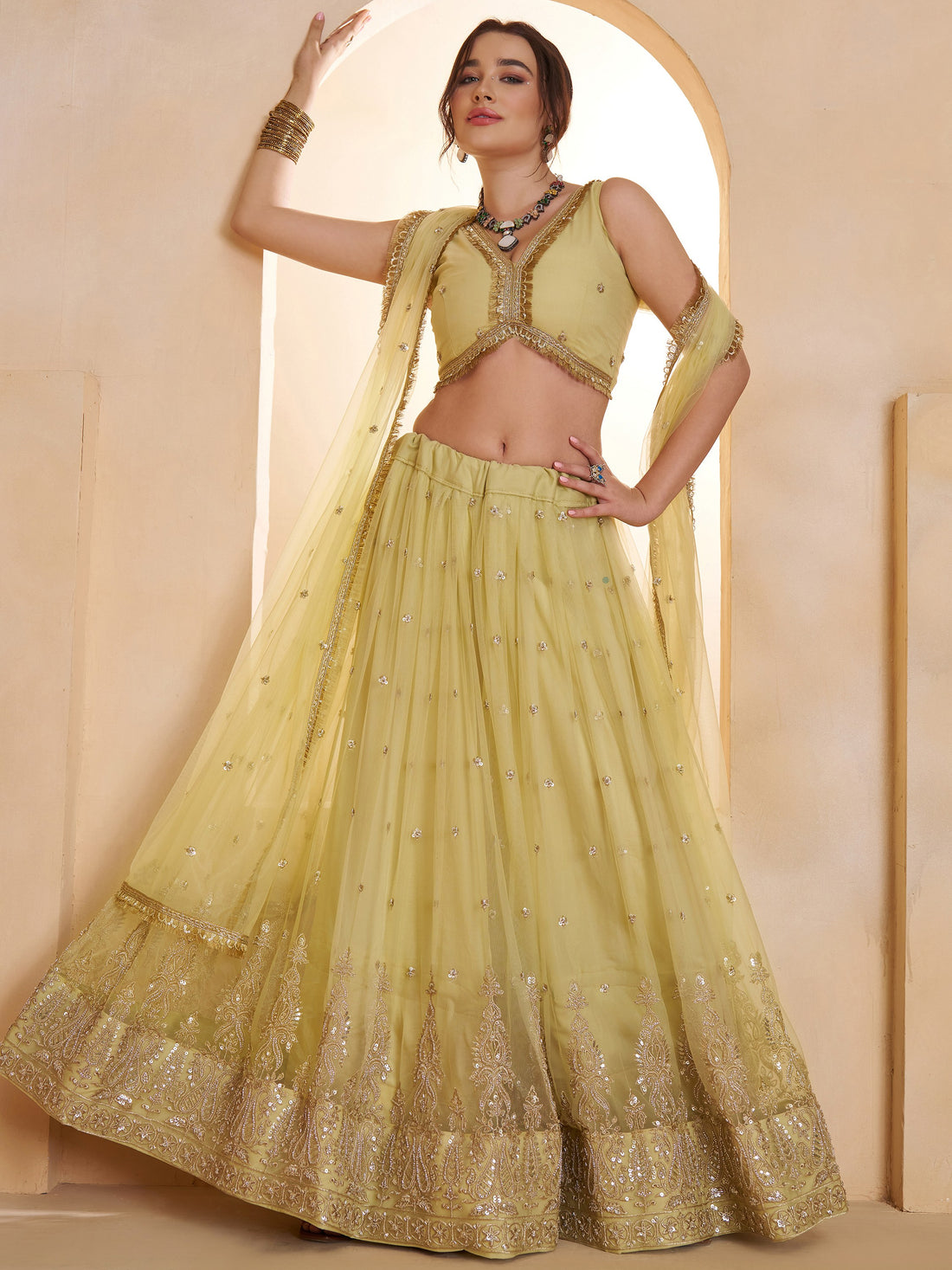 Sparkling Pastel Yellow Sequins Net Haldi Wear Lehenga Choli