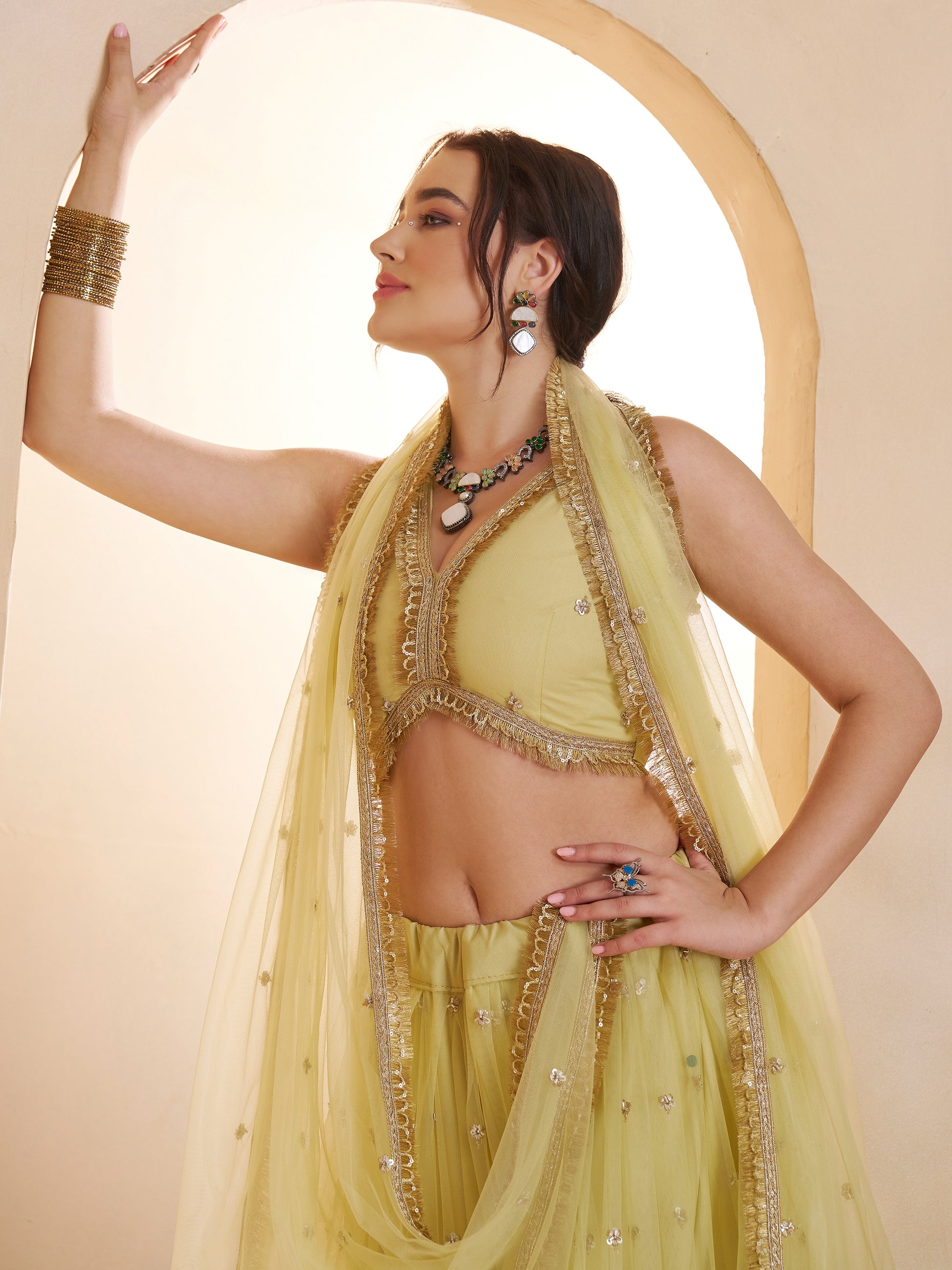 Sparkling Pastel Yellow Sequins Net Haldi Wear Lehenga Choli