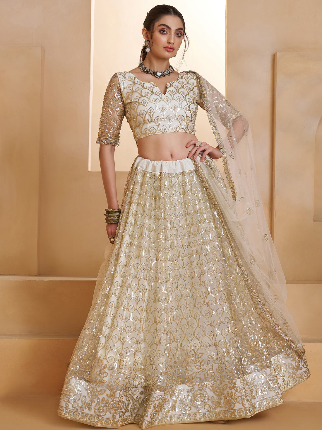 Elegant Off-White Thread Work Net Wedding Wear Lehenga Choli