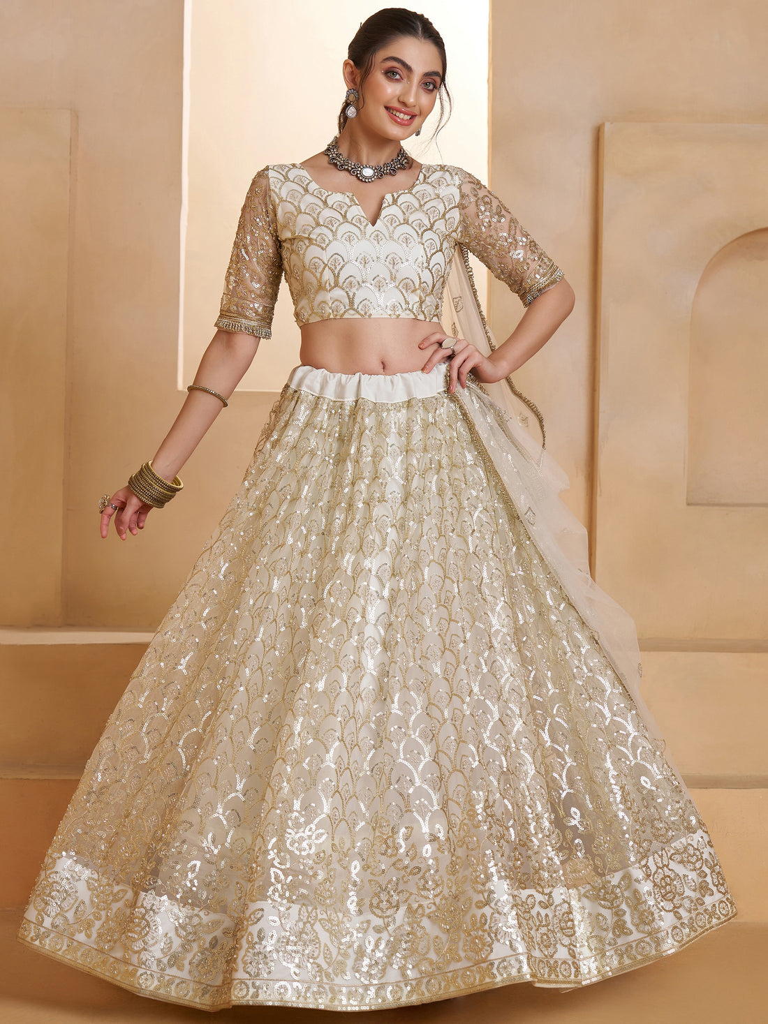 Elegant Off-White Thread Work Net Wedding Wear Lehenga Choli