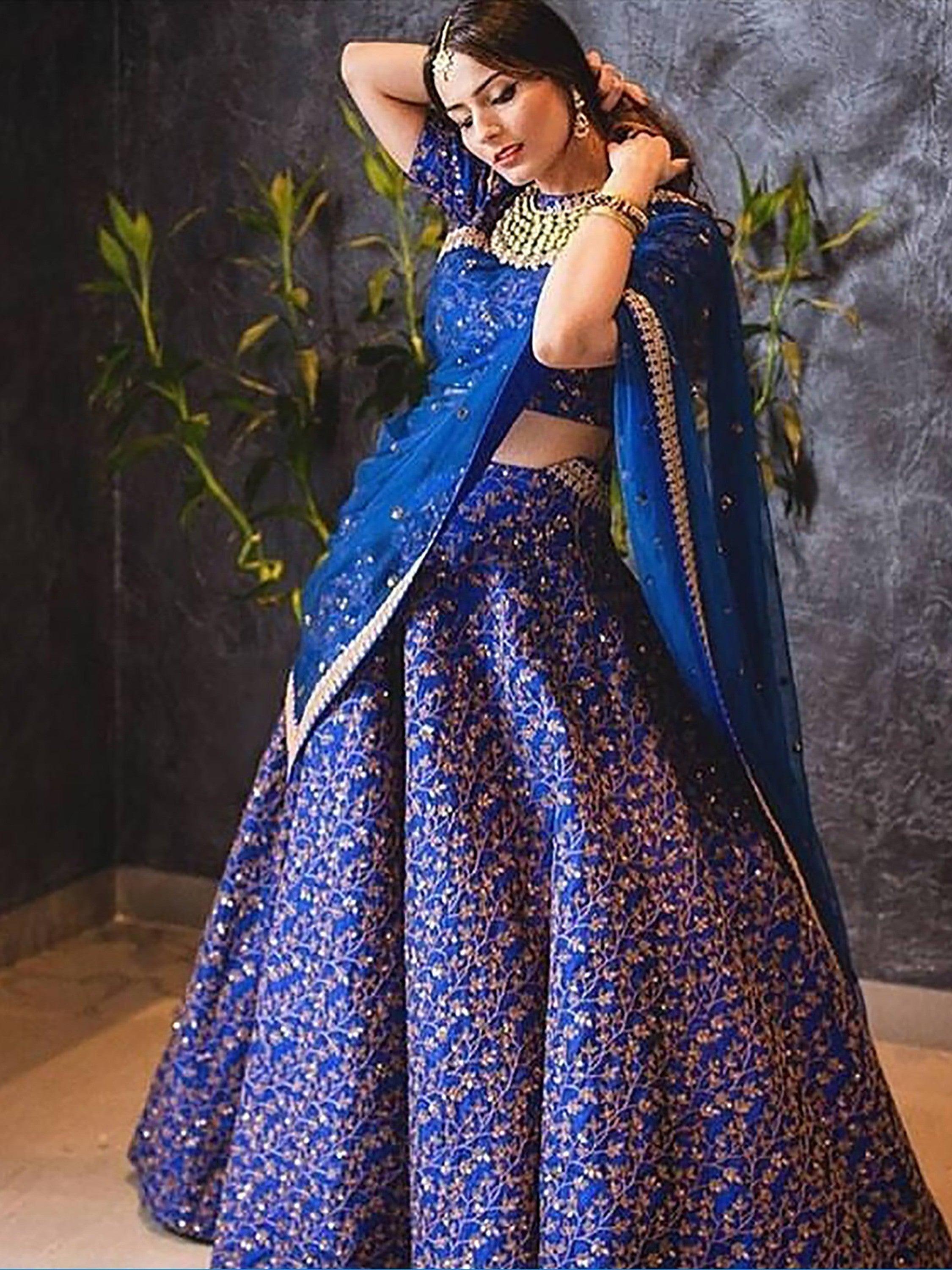 Buy Blue Colored Designer Heavy Embroidered Raw Silk Lehenga Online At Zeel Clothing