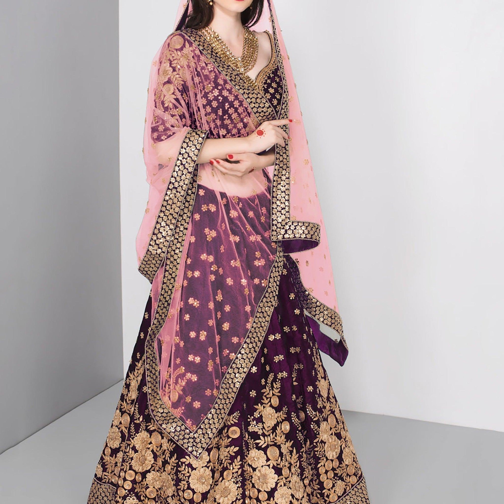 Stunning Purple Colored Partywear Embroidered Lehenga Choli
