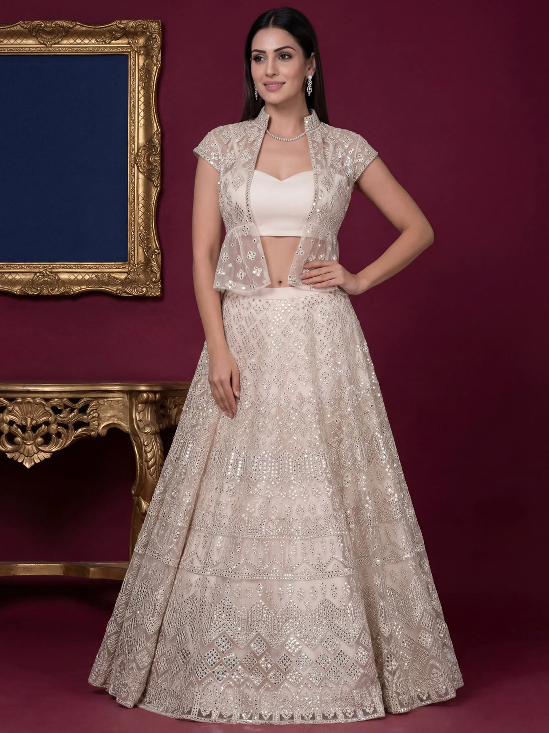 Rich Off-White Foil Work Net Reception Wear Lehenga Choli With Jacket